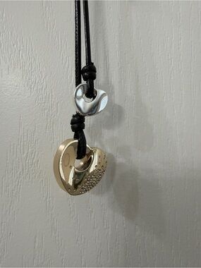 Chico's Black Necklace with two hearts.